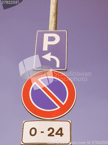 Image of  No parking sign over blue sky vintage