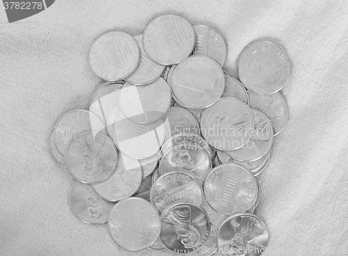 Image of Black and white Dollar coins 1 cent wheat penny
