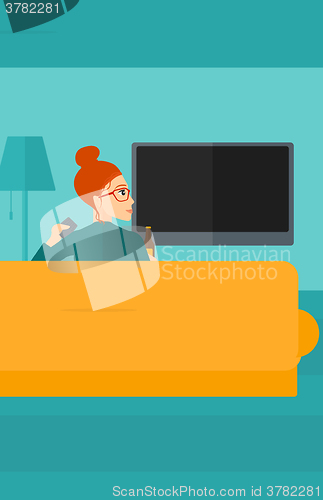 Image of Woman watching TV.