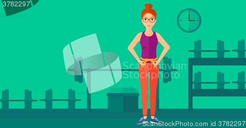 Image of Woman measuring waist.