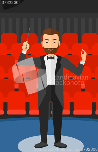 Image of Conductor directing with baton.