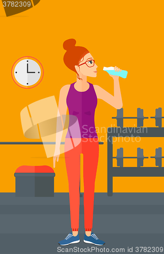 Image of Woman drinking water.