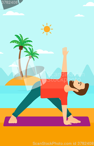 Image of Man practicing yoga.