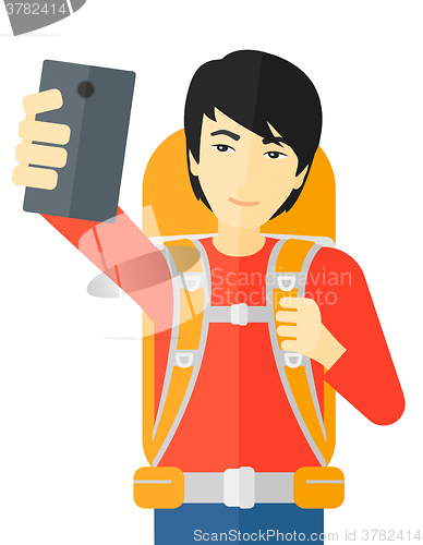 Image of Man making selfie.