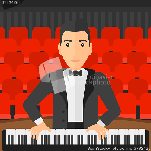 Image of Man playing piano.