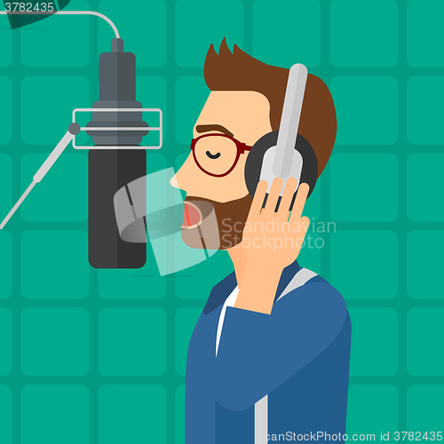 Image of Singer making record. 