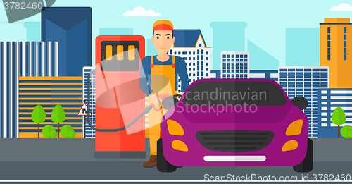 Image of Man filling up fuel into car.