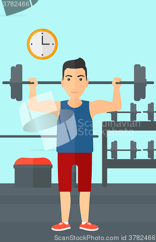 Image of Man lifting barbell.