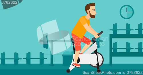 Image of Man doing cycling exercise.