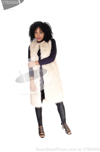 Image of African American woman in fur coat.