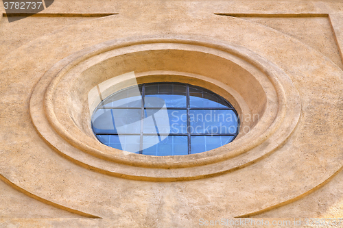 Image of  incision   in house  window    italy  lombardy    rose window  