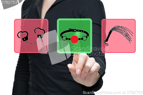 Image of Sex Toys word on virtual screen push by business woman. gag button