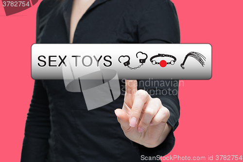 Image of Sex Toys word on virtual screen push by business woman. 