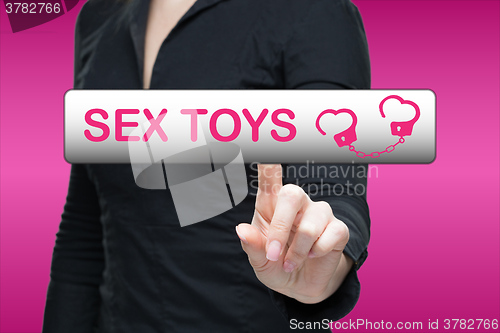 Image of Sex Toys word on virtual screen push by business woman. 