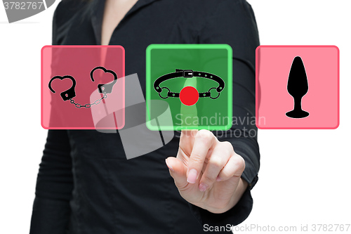 Image of Sex Toys word on virtual screen push by business woman. gag button