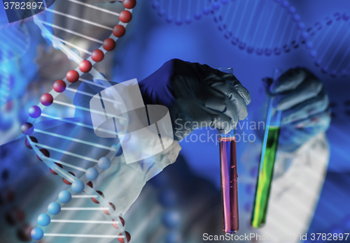 Image of close up of scientist making test in laboratory