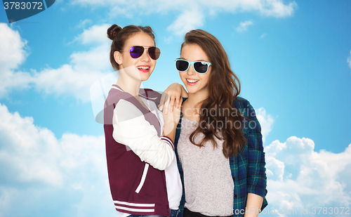 Image of happy smiling pretty teenage girls in sunglasses