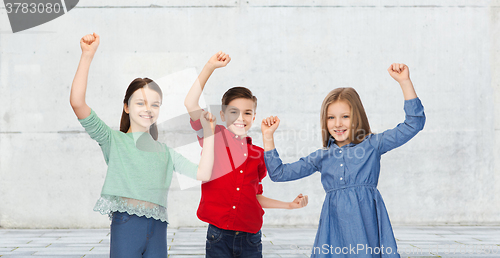 Image of happy boy and girls celebrating victory