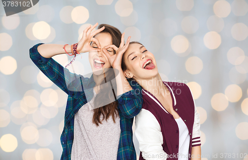 Image of happy smiling pretty teenage girls having fun