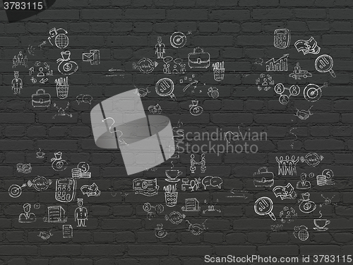 Image of Grunge background: Black Brick wall texture with Painted Hand Drawn Business Icons