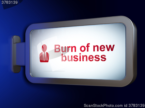 Image of Finance concept: Burn Of new Business and Business Man on billboard background