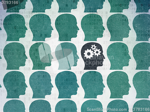 Image of Learning concept: head with gears icon on Digital Paper background