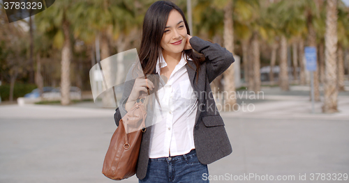 Image of Thoughtful attractive young woman