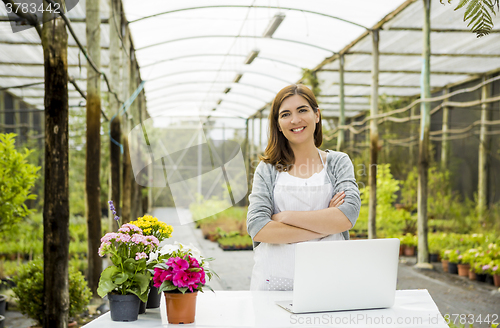 Image of Woman working in a flower shop