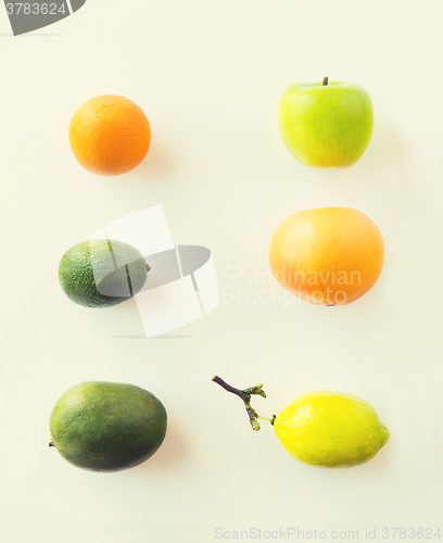 Image of ripe fruits and vegetables over white