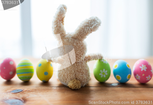 Image of close up of colored easter eggs and bunny