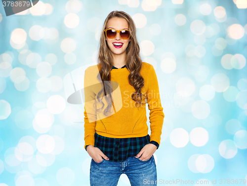 Image of happy young woman or teen girl in casual clothes
