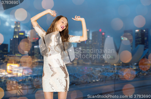 Image of happy young woman or teen girl in fancy dress