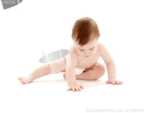 Image of sitting baby boy in diaper