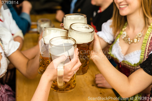 Image of Bavarian girls drinking beer