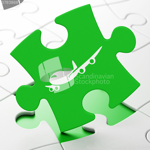 Image of Travel concept: Airplane on puzzle background