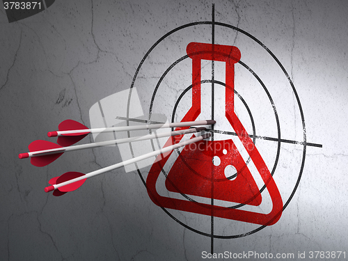 Image of Science concept: arrows in Flask target on wall background