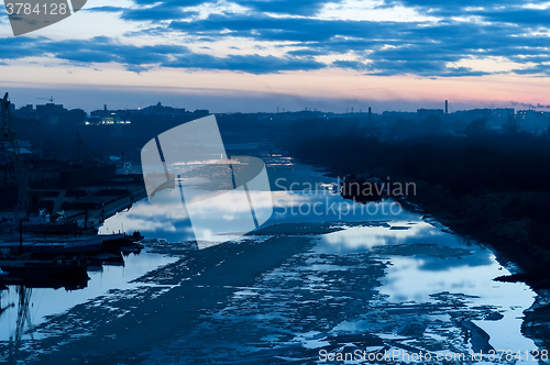 Image of Twilight view on river in spring season. Tyumen