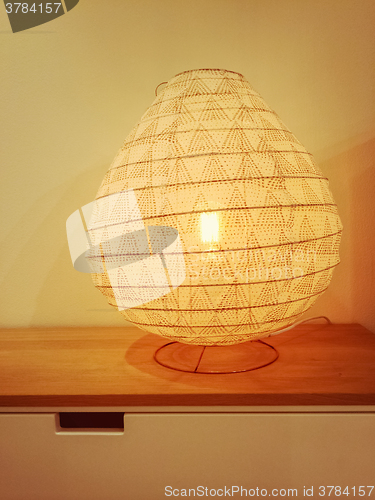 Image of Cozy lamp giving warm yellow light