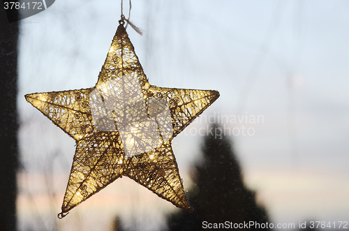 Image of Christmas star on a window