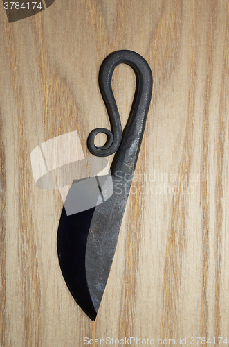 Image of traditional finnish knife puukko on wood