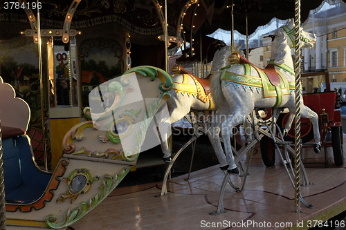 Image of traditional carousel at Christmas market in Helsinki