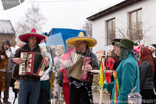 Image of People attend the Masopust Carnival
