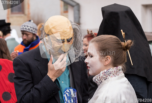 Image of People attend the Masopust Carnival