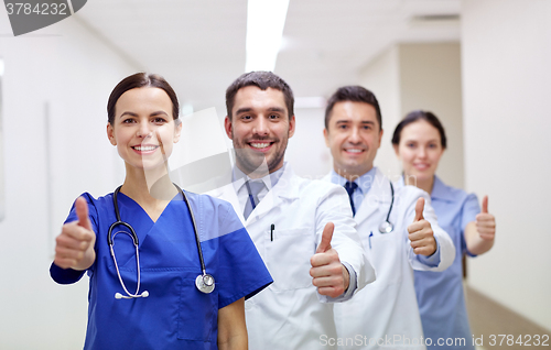 Image of medics or doctors at hospital showing thumbs up