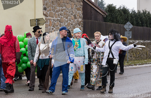 Image of People attend the Masopust Carnival