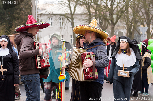 Image of People attend the Masopust Carnival