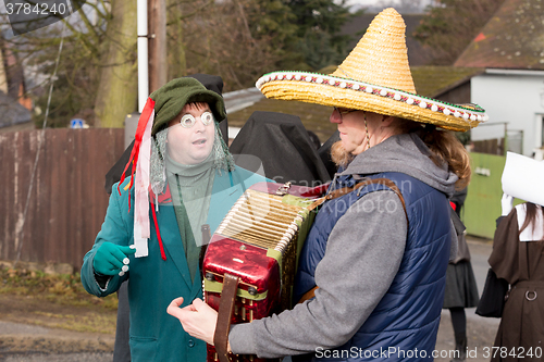 Image of People attend the Masopust Carnival