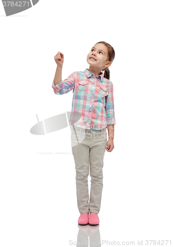 Image of girl looking up and holding something invisible