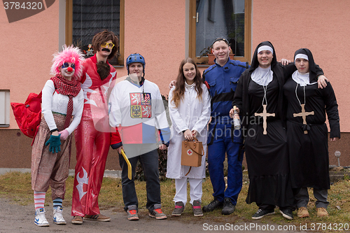 Image of People attend the Masopust Carnival