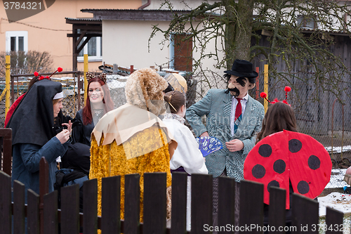 Image of People attend the Masopust Carnival